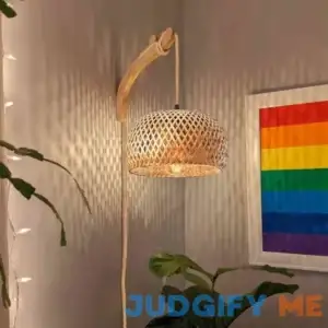 Witherbee Rattan Plug-in Armed Sconce Bay Isle Home Bulb Included